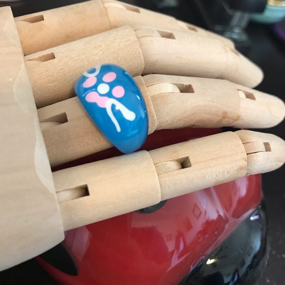 Blue plastic bubble ring w/ pink flower